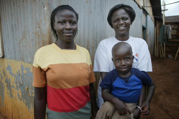 Rebrand Post (7) Tabitha Festo with two of her children in Kibera (Photo Credit, CFK).